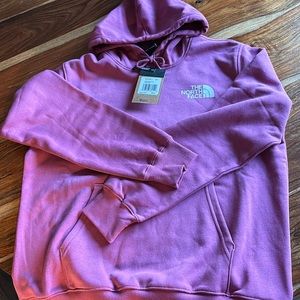 Men’s large North Face pink hoodie with black logo. NWT